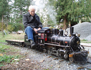All Aboard! Woody Runnells has never lost his love of trains.